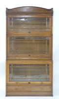 Lot 715 - A Lebus oak three stack bookcase