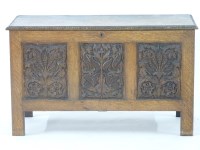 Lot 735 - A reproduction oak coffer