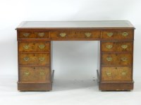 Lot 701 - A Victorian walnut desk