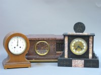 Lot 431 - A red marble mantel clock