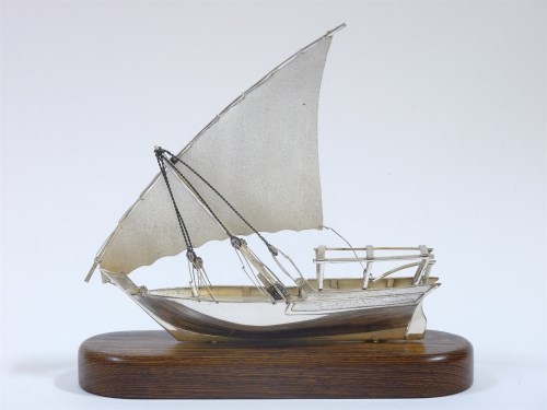 Lot 157 - A silver model of a dhow