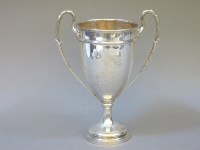 Lot 185 - A silver two handled presentation trophy