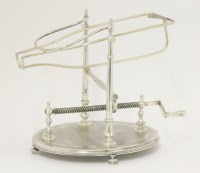 Lot 49 - A Continental silver-plated wine cradle