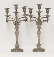 Lot 50 - A pair of George III old sheffield plate three light folding bracket candelabra