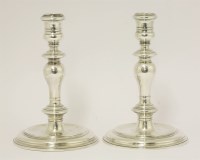 Lot 119 - A pair of britannia standard silver candlesticks
