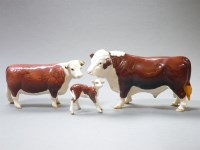 Lot 256 - A group of Beswick Hereford cattle