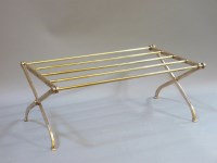 Lot 784 - An Edwardian brass folding luggage stand