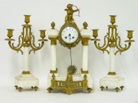 Lot 323 - A white mantel and gilt spelter clock garniture