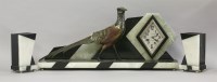 Lot 407 - An Art Deco clock garniture