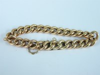 Lot 42 - An American gold curb chain bracelet