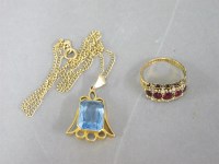 Lot 45 - A blue paste pendant