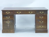 Lot 778 - A 20th century oak twin pedestal desk