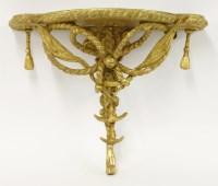 Lot 438 - A gilt gesso wall shelf of marine interest