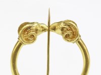 Lot 283 - An Archaeological Revival gold penannular brooch