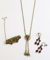 Lot 263 - A pair of Georgian gold foiled back garnet girandole drop earrings