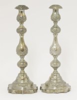 Lot 123 - A pair of silver Sabbath candlesticks