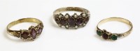 Lot 261 - A Victorian 12ct gold garnet and split pearl ring