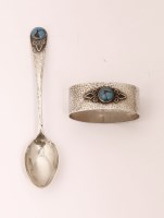 Lot 85 - A silver teaspoon and napkin ring
