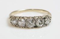 Lot 304 - A late Victorian five stone diamond carved head ring with diamond set points