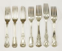 Lot 84 - Four assorted Georgian and later silver king's pattern table forks
