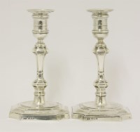 Lot 88 - A pair of silver candlesticks