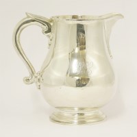 Lot 102 - A large silver water jug