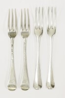 Lot 171 - A set of twelve George II silver hanoverian pattern three prong dessert forks