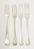 Lot 172 - A set of ten George II silver three prong hanoverian pattern table forks