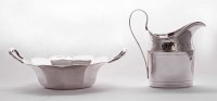 Lot 167 - A George III silver cream jug