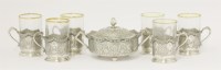 Lot 17 - A set of six Persian metalwares cup holders