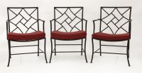 Lot 739 - A set of eight wrought iron 'cockpen' elbow chairs