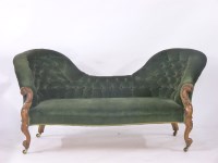 Lot 610 - A Victorian walnut double spoon back settee