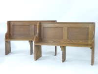 Lot 727 - A pair of small panelled oak pews