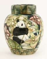 Lot 241 - A Moorcroft 'Panda' jar and cover