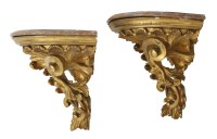 Lot 1399 - A pair of 19th century Italian giltwood corner brackets