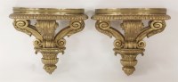 Lot 491 - A pair of Empire carved and giltwood wall brackets