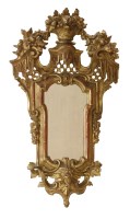 Lot 498 - A carved and giltwood mirror