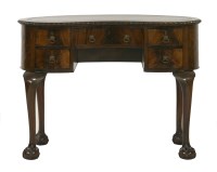 Lot 1520 - A mahogany kidney shaped dressing table