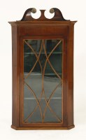 Lot 1523 - A George III mahogany and inlaid hanging corner cupboard