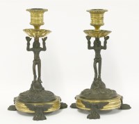 Lot 99 - A pair of small bronze candlesticks