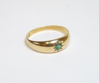 Lot 22 - An 18ct gold single stone star set gypsy ring