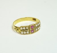 Lot 26 - A gold ruby and split pearl half hoop ring