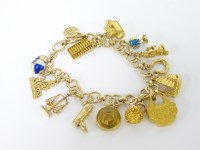 Lot 10 - A 9ct gold charm bracelet