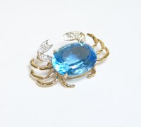 Lot 36 - A blue topaz and diamond set crab brooch/pendant