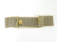 Lot 44 - A 9ct gold two colour gold woven link bracelet