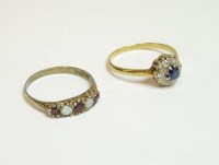 Lot 71 - A sapphire and diamond circular cluster ring