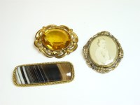 Lot 33 - A Victorian gold memorial swivel brooch