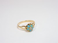 Lot 15 - A diamond and turquoise boss