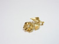 Lot 55 - A 9ct gold rose brooch