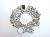 Lot 80 - A sterling silver charm bracelet